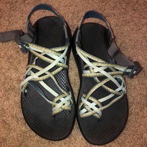 three string green Chacos
